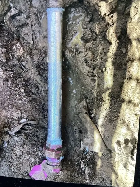 A broken, corroded pipe that caused water damage in an Elkridge, MD home